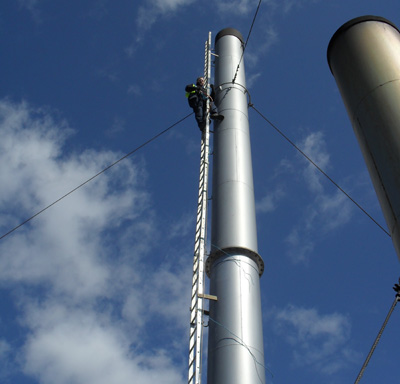 Steeplejack working on chimney